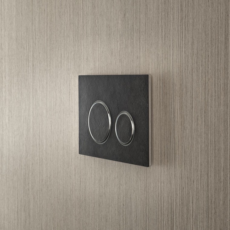 The Sigma 21 flush button in slate The Sigma 21 flush button in slate