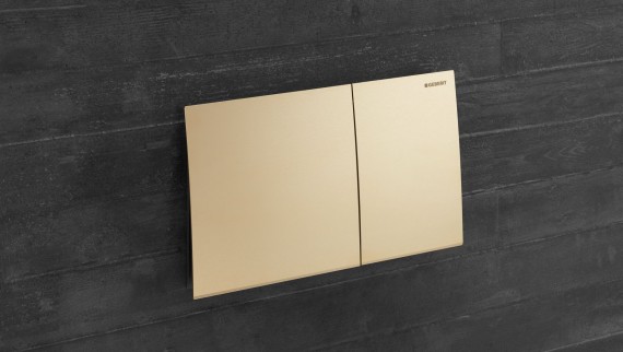 Stainless steel Geberit Sigma70 in brass (© Geberit) Stainless steel Geberit Sigma70 in brass (© Geberit)