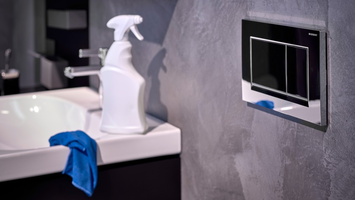 Cleaning agent and cloth in clean bathroom Cleaning agent and cloth in clean bathroom